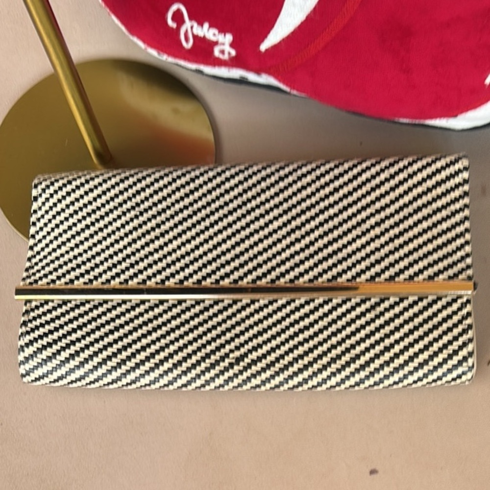 Atmosphere Black and White Diagonal Stripe Clutch with Gold Bar